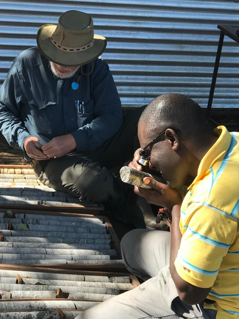 Geologists analysing core samples